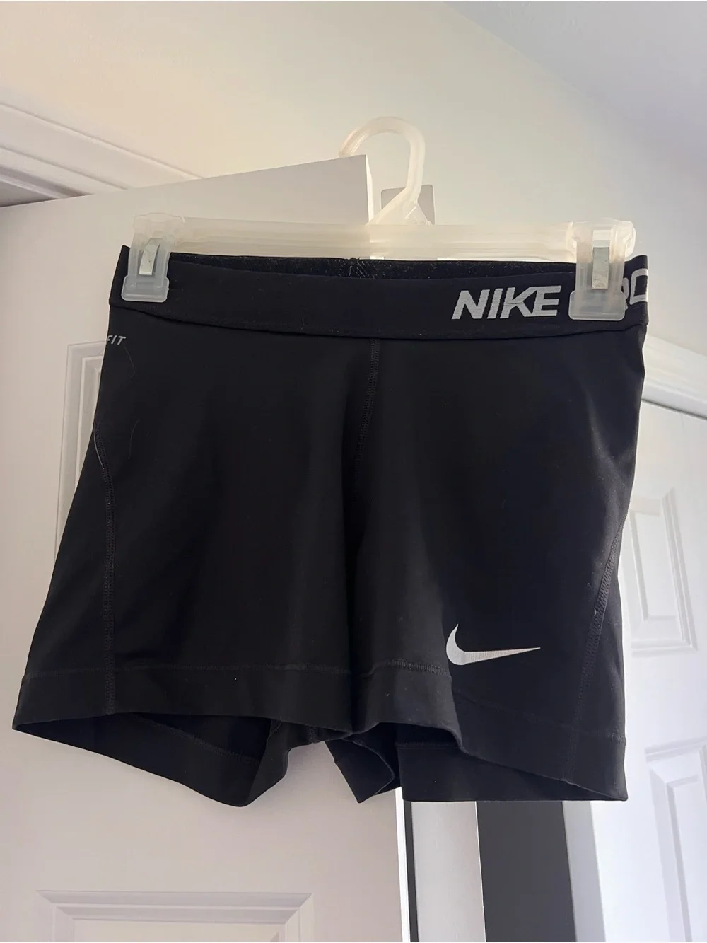 Nike Pros Black Athletic Shorts with White Swoosh